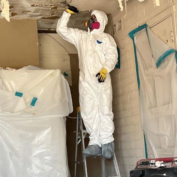 Asbestos removal work on a ceiling